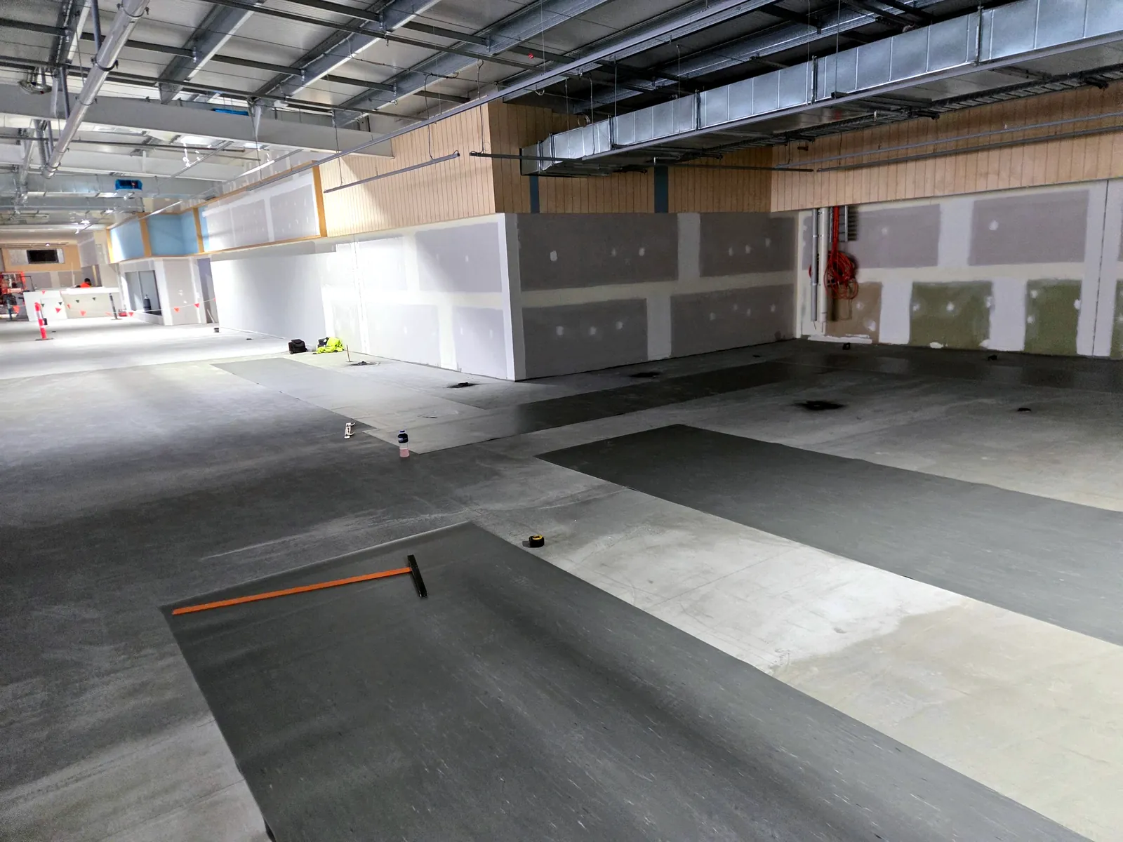 Armstrong Armalon sheet vinyl runs being laid at Coles Annerley