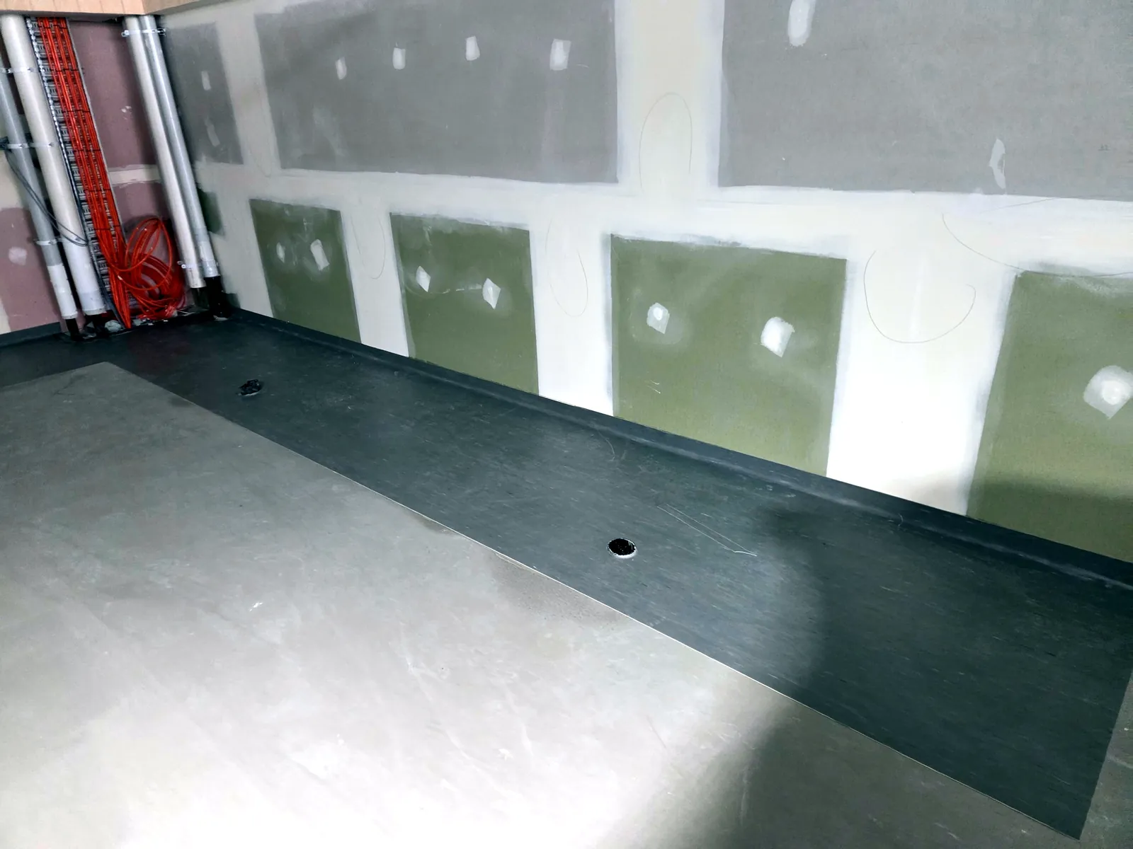 Sheet vinyl coved up the wall in back of house at Coles Annerley
