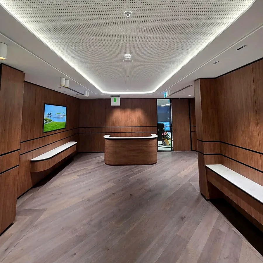 Diagonal engineered oak with a matching border at the reception