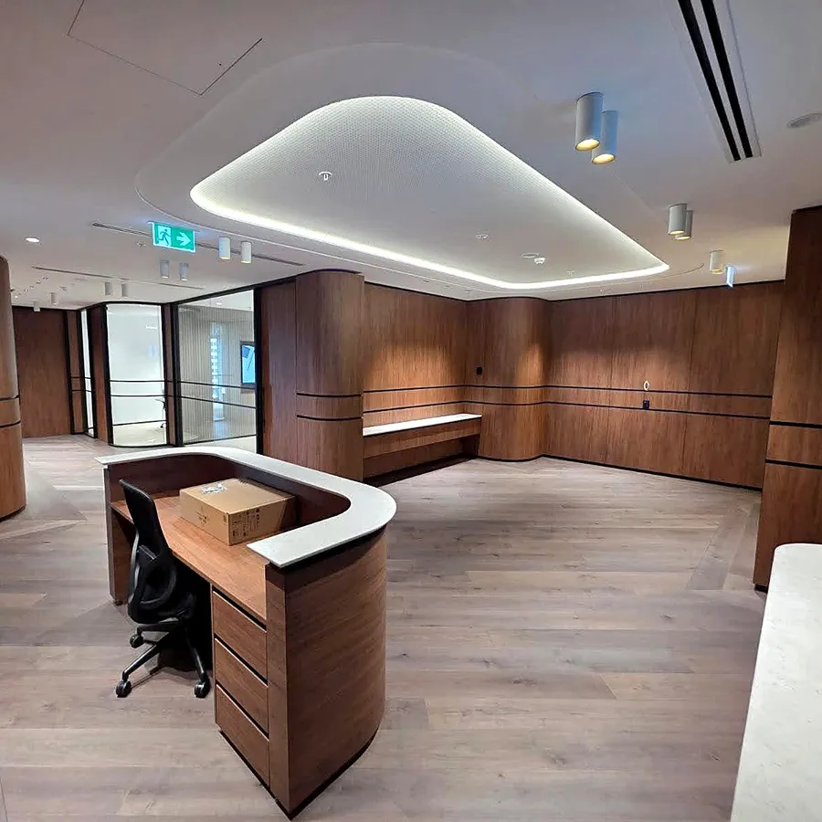 Reception desk and lounge on diagonal oak